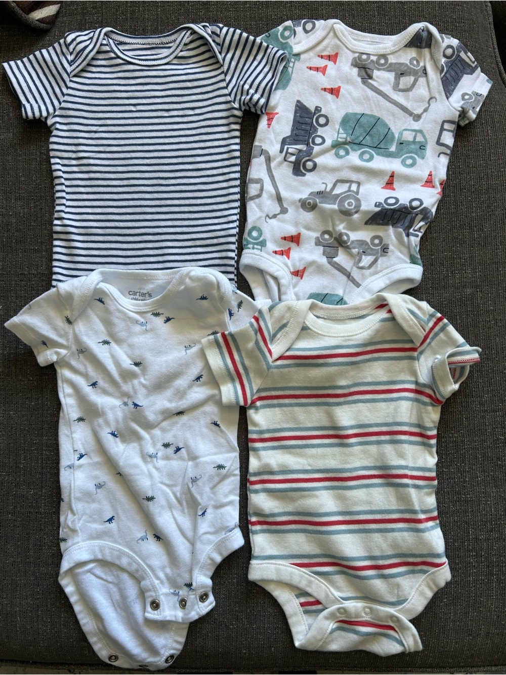 5/$25 Baby Boy Onesies, Carters and Gap, dinosaur and construction prints.